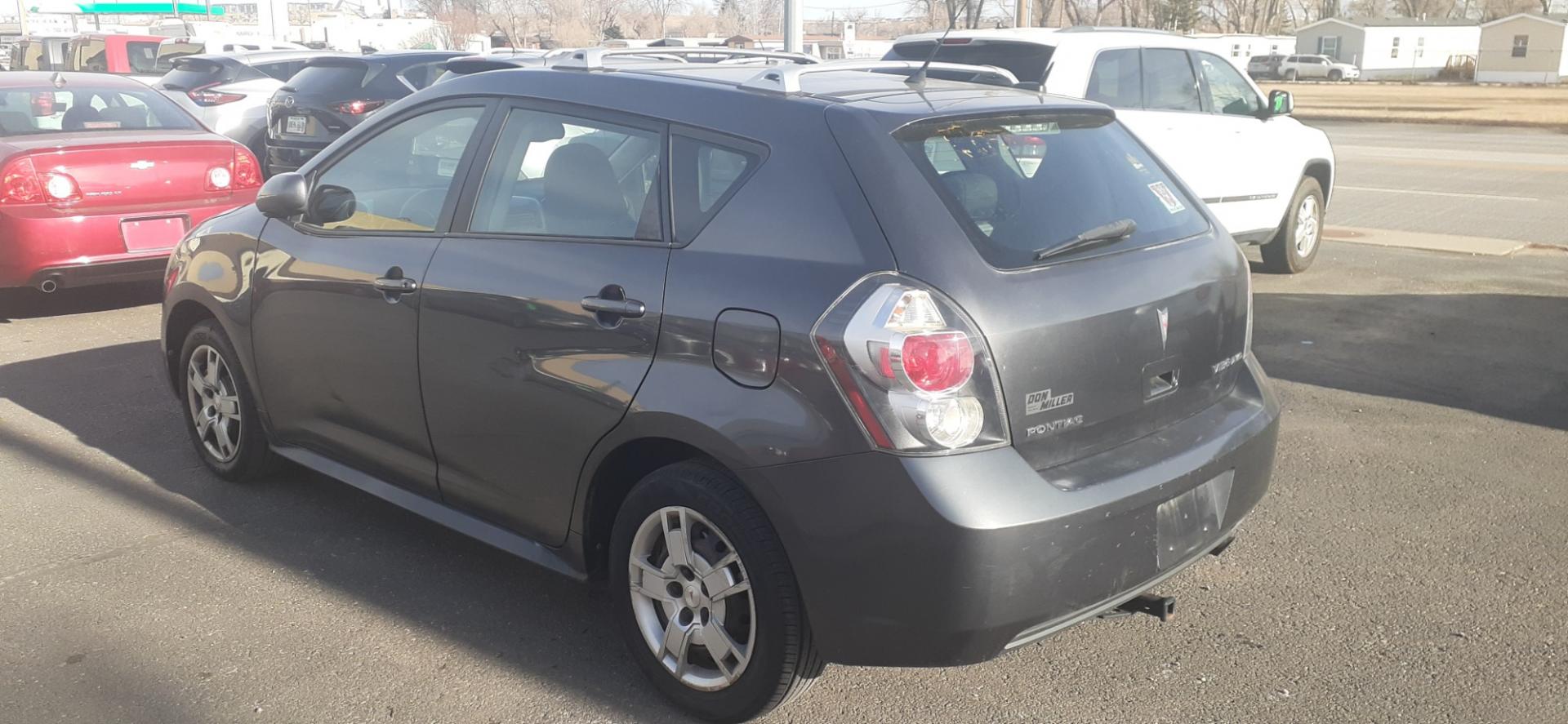 2010 Pontiac Vibe AWD (5Y2SM6E01AZ) with an 2.4L L4 DOHC 16V engine, 4-Speed Automatic transmission, located at 2015 Cambell Street, Rapid City, SD, 57701, (605) 342-8326, 44.066433, -103.191772 - CARFAX AVAILABLE - Photo#2